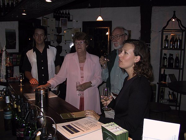 Samantha ordering her next wine sample.