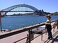 Samantha's turn have her photo taken in front of the Sydney Harbour Bridge